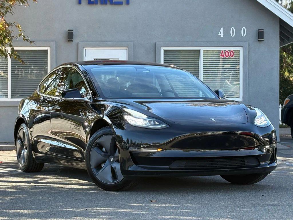 used 2018 Tesla Model 3 car, priced at $14,999
