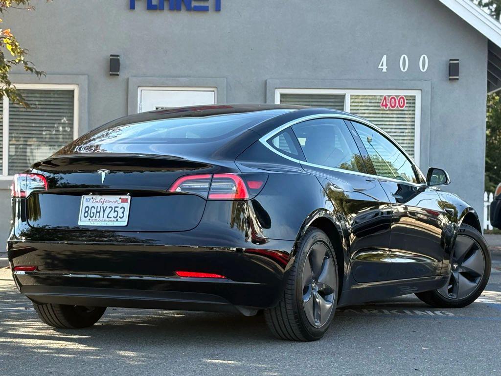 used 2018 Tesla Model 3 car, priced at $14,999