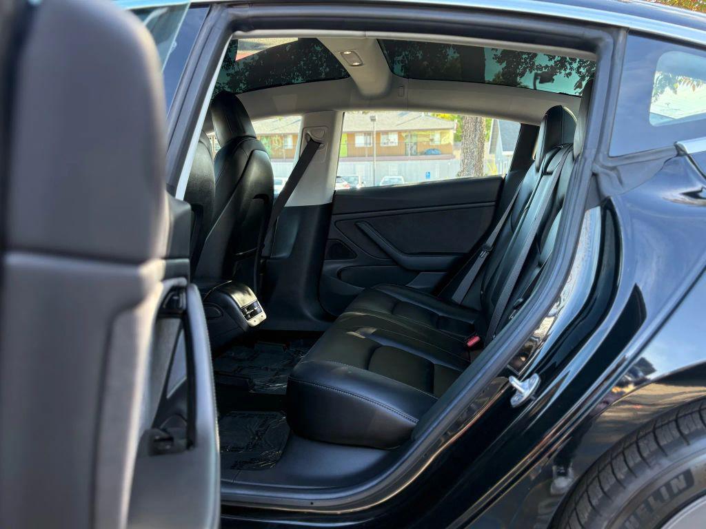 used 2018 Tesla Model 3 car, priced at $14,999