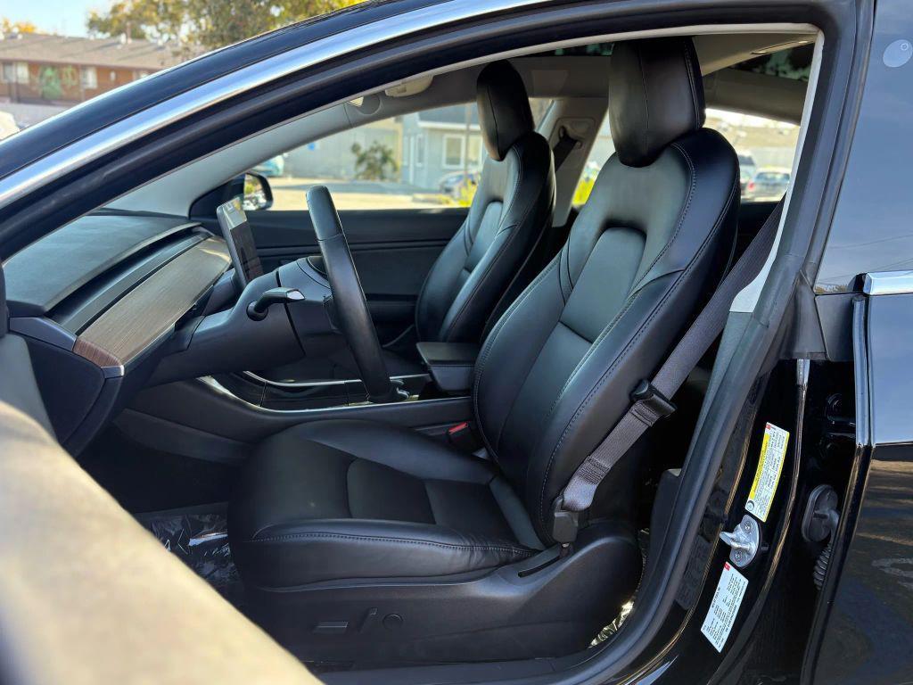 used 2018 Tesla Model 3 car, priced at $14,999