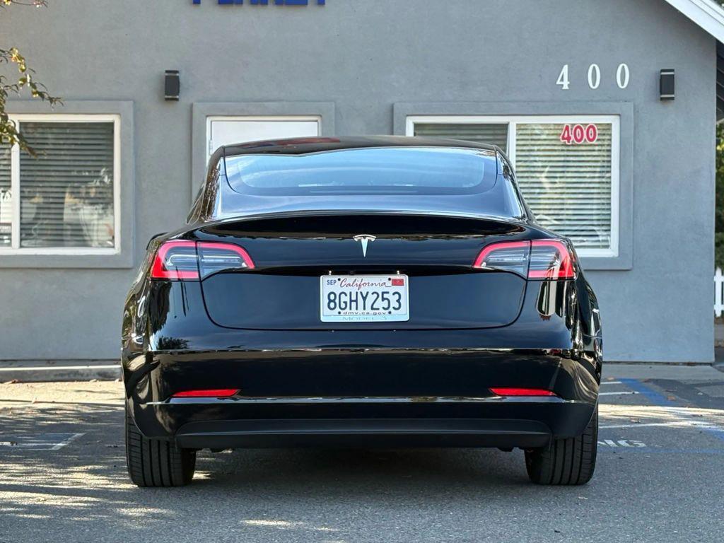used 2018 Tesla Model 3 car, priced at $14,999