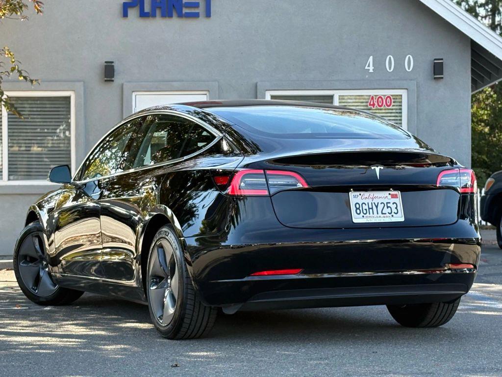 used 2018 Tesla Model 3 car, priced at $14,999