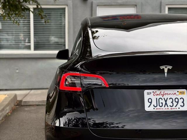 used 2023 Tesla Model Y car, priced at $33,999