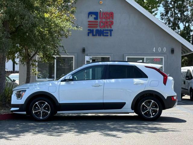 used 2023 Kia Niro Plug-In Hybrid car, priced at $16,999