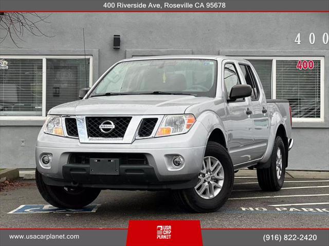 used 2019 Nissan Frontier car, priced at $19,999