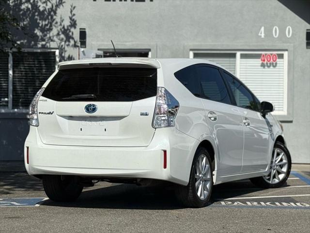 used 2014 Toyota Prius v car, priced at $9,999