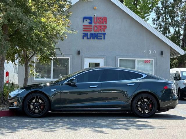 used 2013 Tesla Model S car, priced at $9,999
