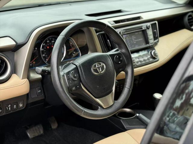 used 2013 Toyota RAV4 car, priced at $13,999