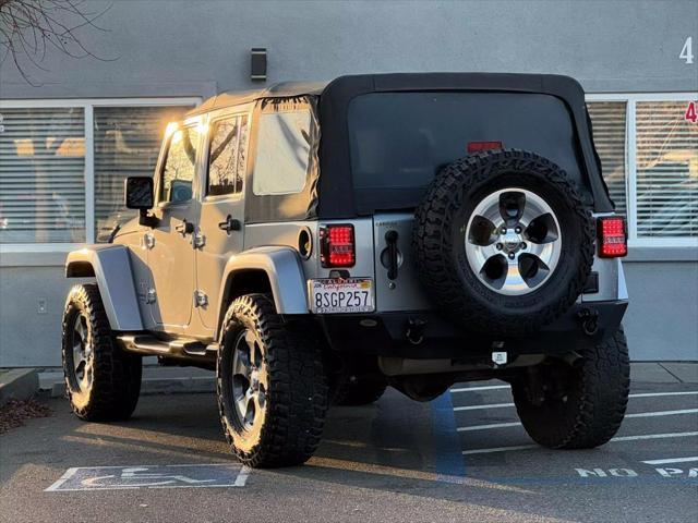 used 2018 Jeep Wrangler JK Unlimited car, priced at $23,999