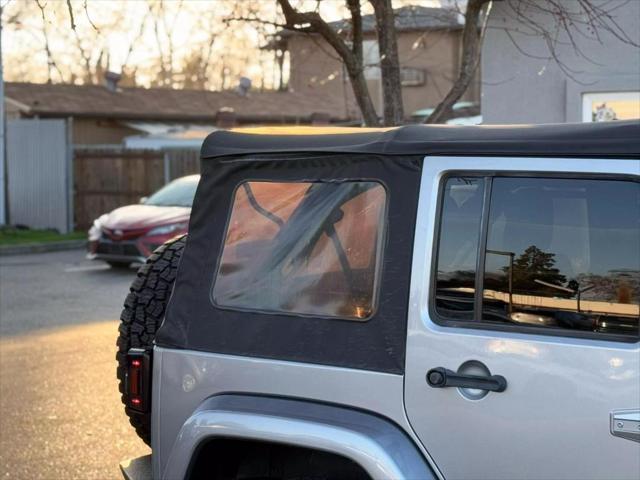 used 2018 Jeep Wrangler JK Unlimited car, priced at $23,999