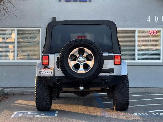 used 2018 Jeep Wrangler JK Unlimited car, priced at $21,999
