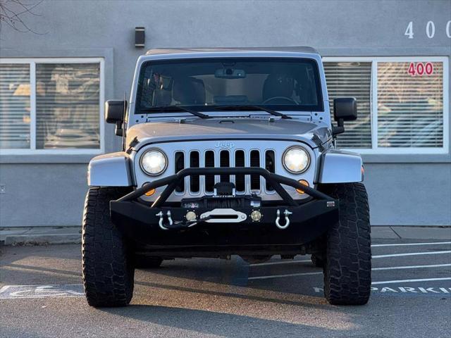 used 2018 Jeep Wrangler JK Unlimited car, priced at $23,999