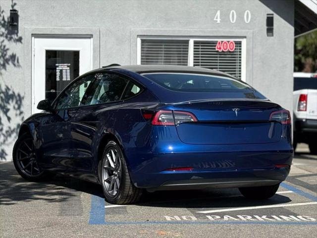 used 2023 Tesla Model 3 car, priced at $17,999
