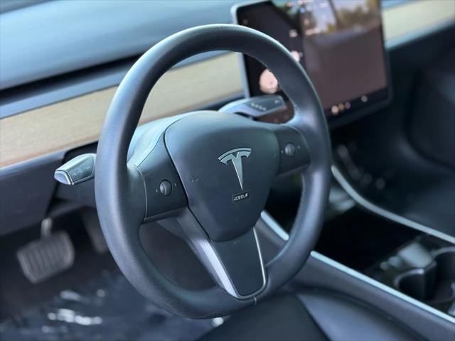 used 2020 Tesla Model 3 car, priced at $14,999