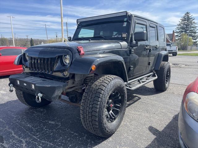 used 2009 Jeep Wrangler Unlimited car, priced at $12,499