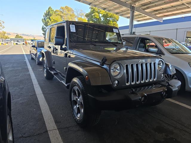 used 2018 Jeep Wrangler JK Unlimited car, priced at $26,100