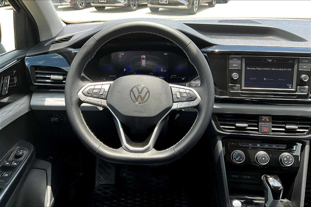 used 2023 Volkswagen Taos car, priced at $21,116
