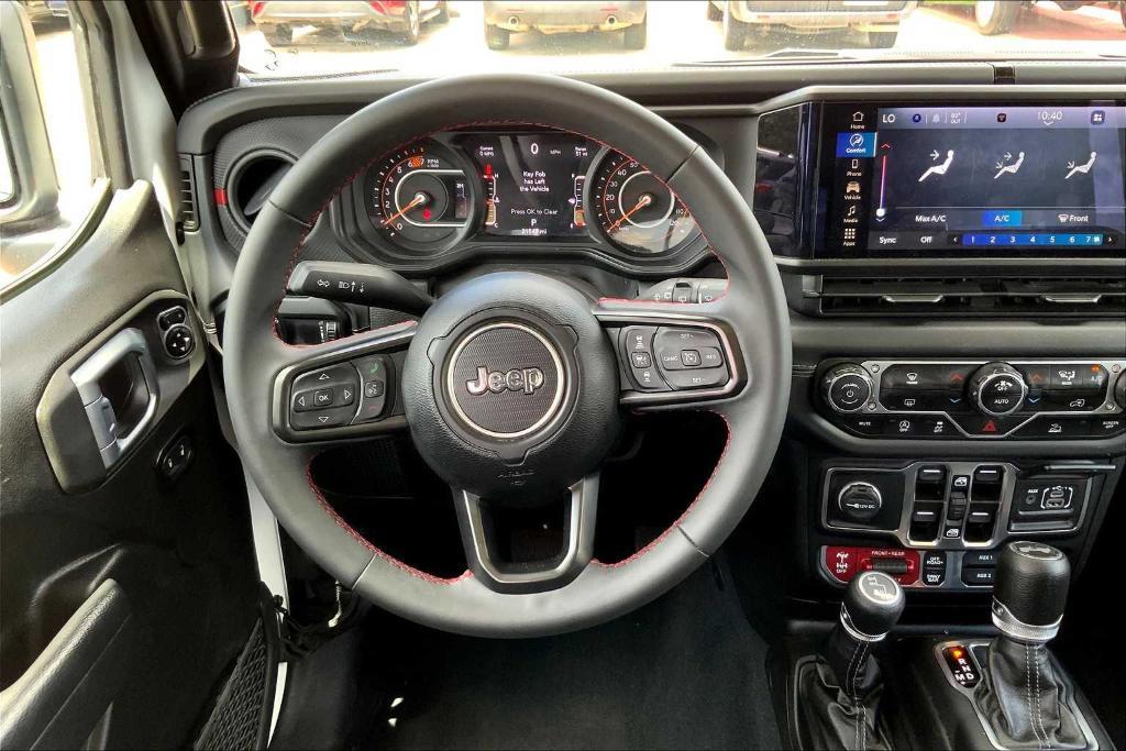 used 2024 Jeep Wrangler car, priced at $43,916