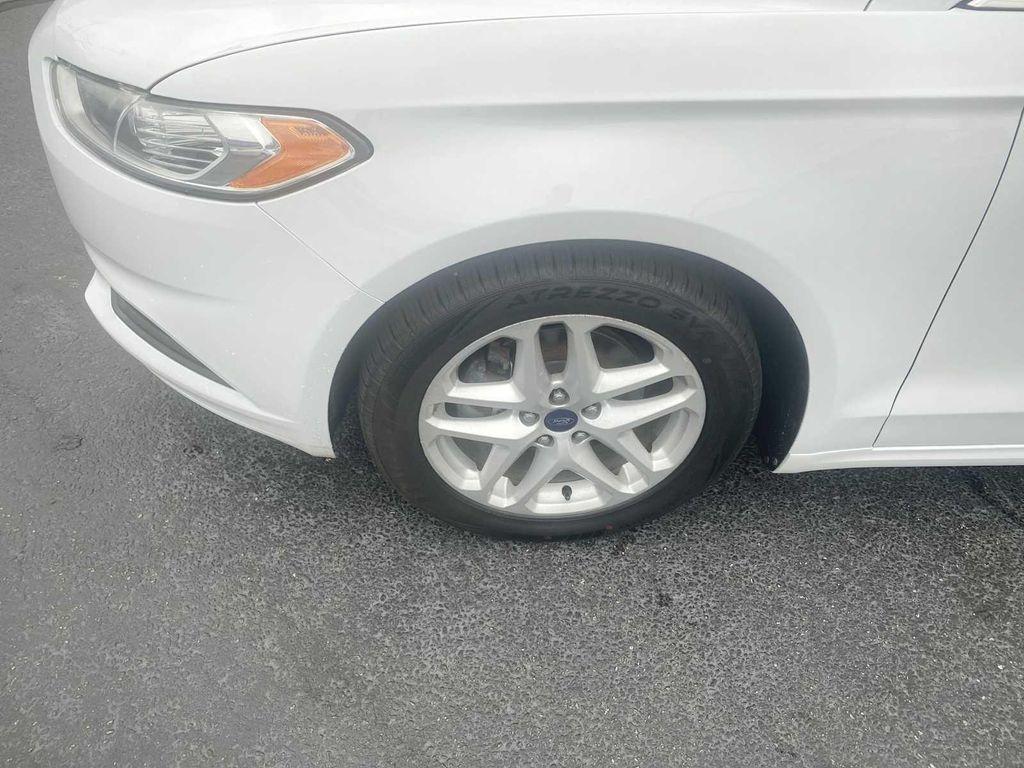 used 2014 Ford Fusion car, priced at $4,800