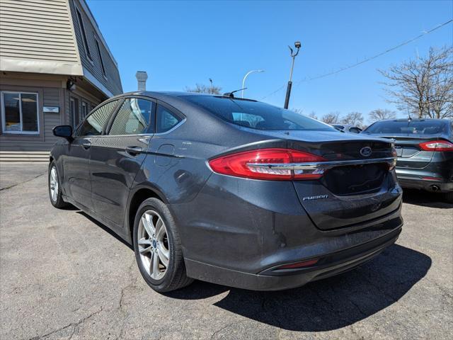 used 2018 Ford Fusion car, priced at $13,595