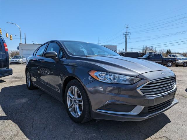 used 2018 Ford Fusion car, priced at $13,595