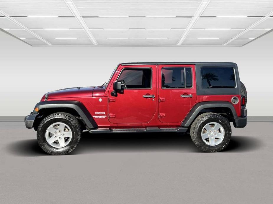 used 2013 Jeep Wrangler Unlimited car, priced at $12,995