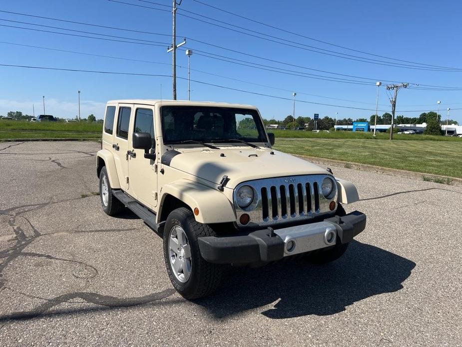 used 2011 Jeep Wrangler Unlimited car, priced at $15,900