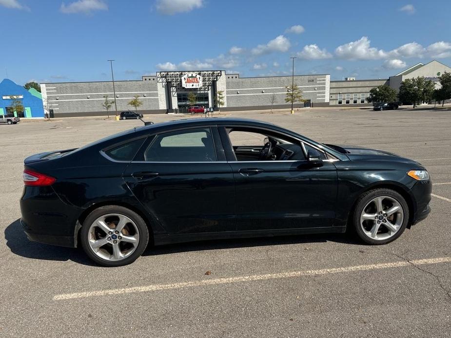 used 2014 Ford Fusion car, priced at $4,995