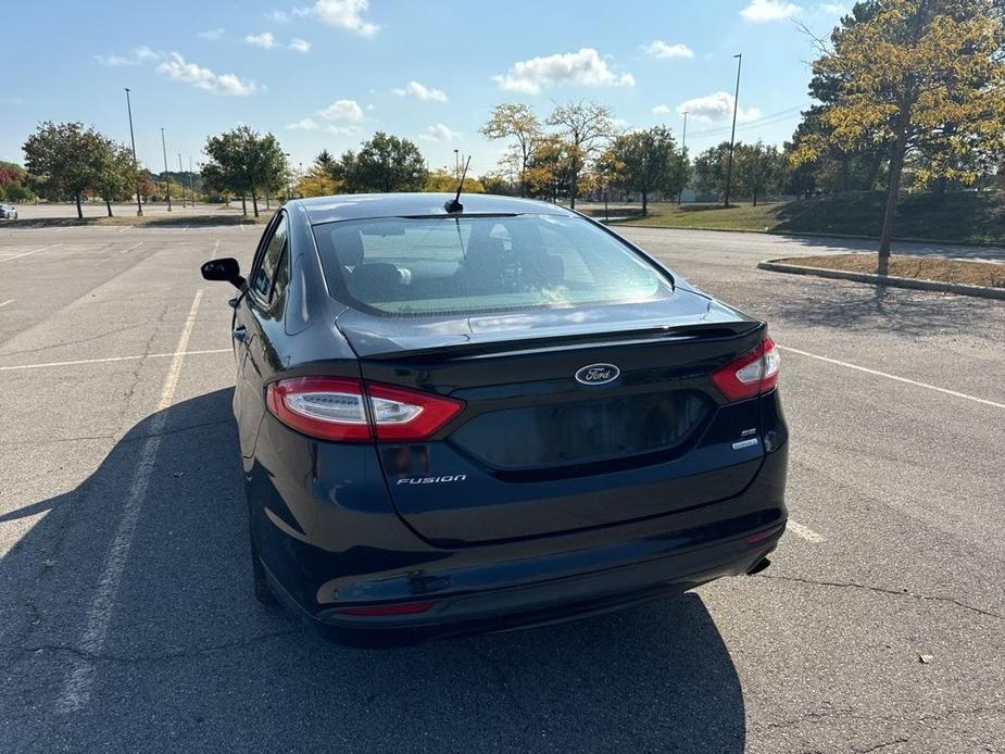 used 2014 Ford Fusion car, priced at $4,995