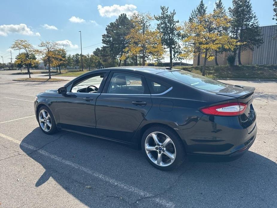 used 2014 Ford Fusion car, priced at $4,995