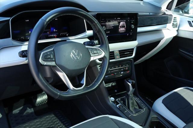 used 2025 Volkswagen Taos car, priced at $29,965