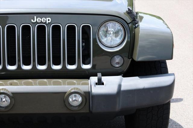 used 2016 Jeep Wrangler Unlimited car, priced at $21,819