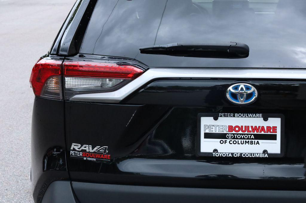 used 2021 Toyota RAV4 Hybrid car, priced at $28,195