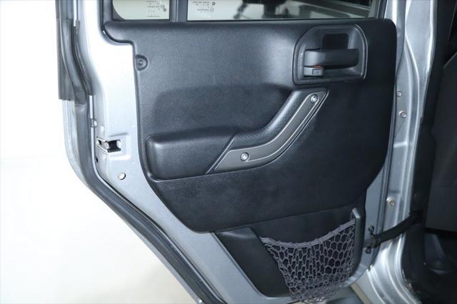 used 2015 Jeep Wrangler Unlimited car, priced at $16,865