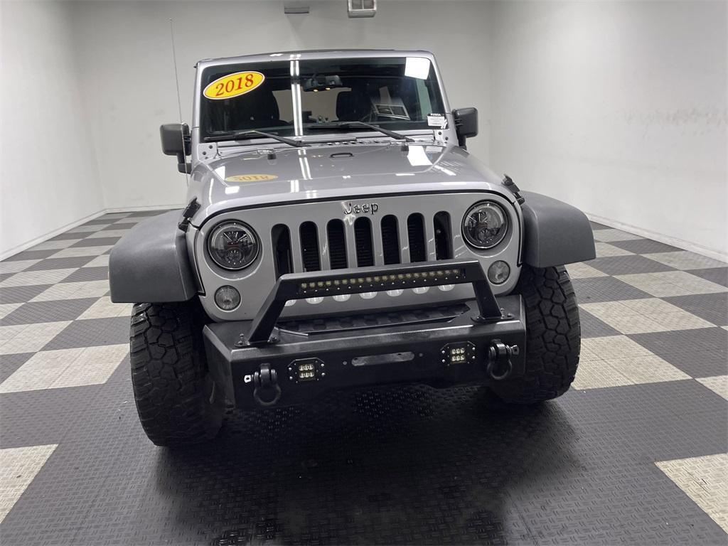 used 2018 Jeep Wrangler JK Unlimited car, priced at $21,476
