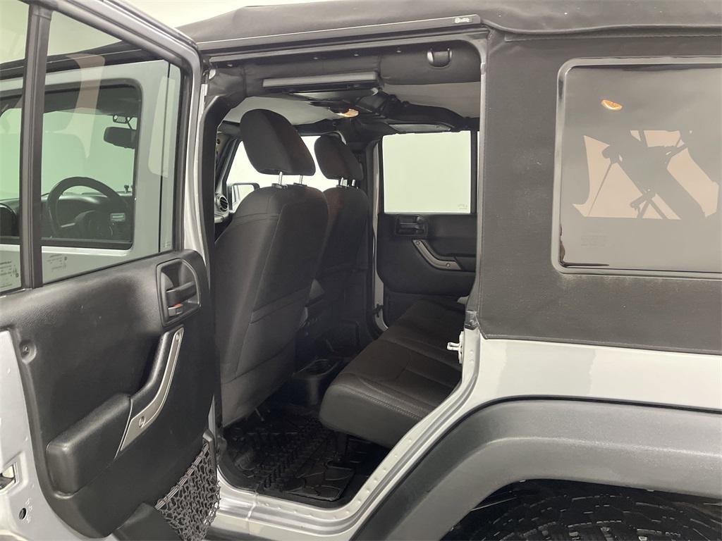 used 2018 Jeep Wrangler JK Unlimited car, priced at $21,476