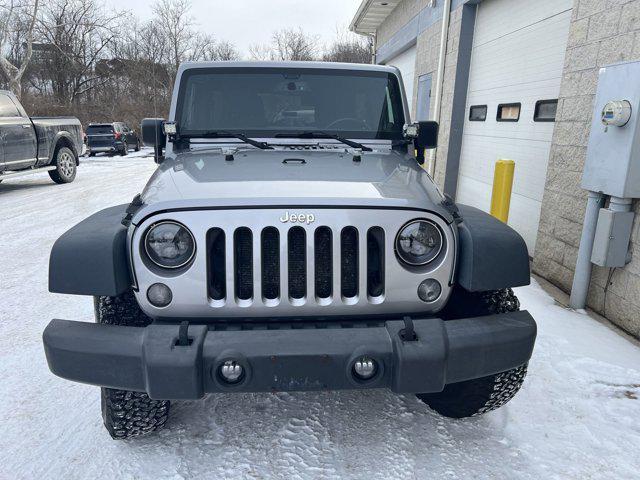 used 2014 Jeep Wrangler Unlimited car, priced at $13,495