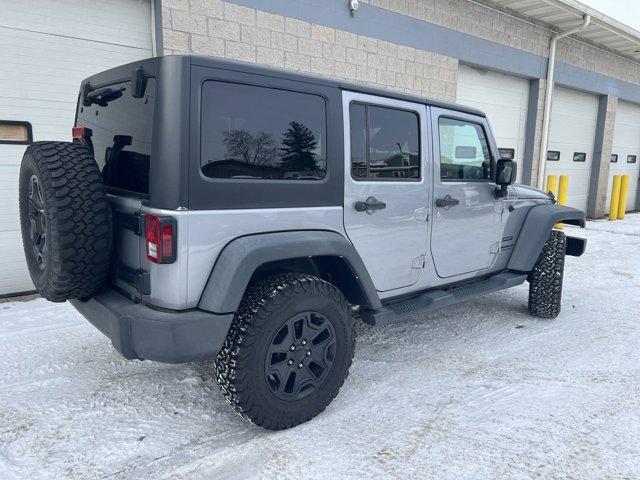 used 2014 Jeep Wrangler Unlimited car, priced at $13,495