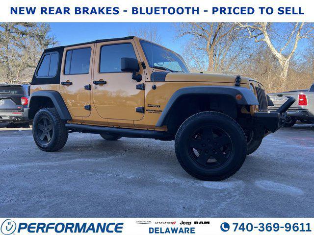 used 2012 Jeep Wrangler Unlimited car, priced at $13,295