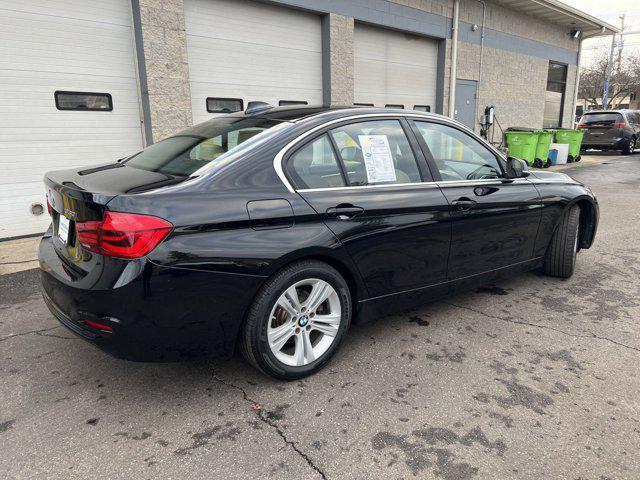 used 2018 BMW 330 car, priced at $19,295