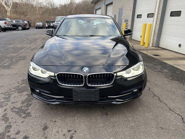 used 2018 BMW 330 car, priced at $19,295