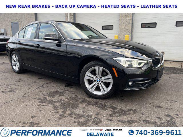 used 2018 BMW 330 car, priced at $19,295