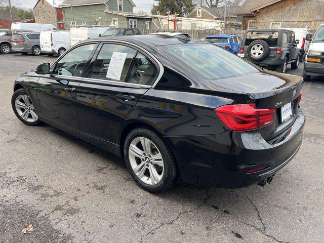 used 2018 BMW 330 car, priced at $19,295