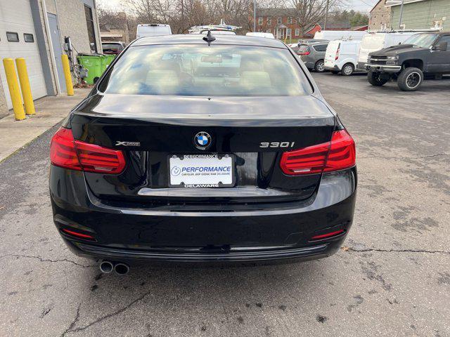 used 2018 BMW 330 car, priced at $19,295