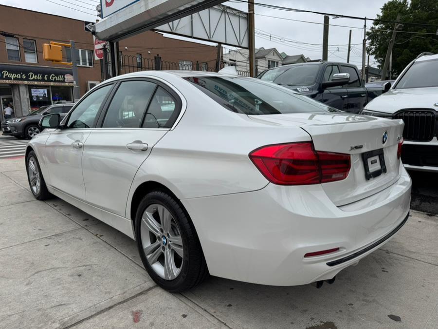 used 2018 BMW 330 car, priced at $14,999