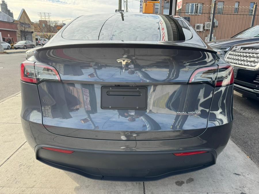 used 2023 Tesla Model Y car, priced at $26,099