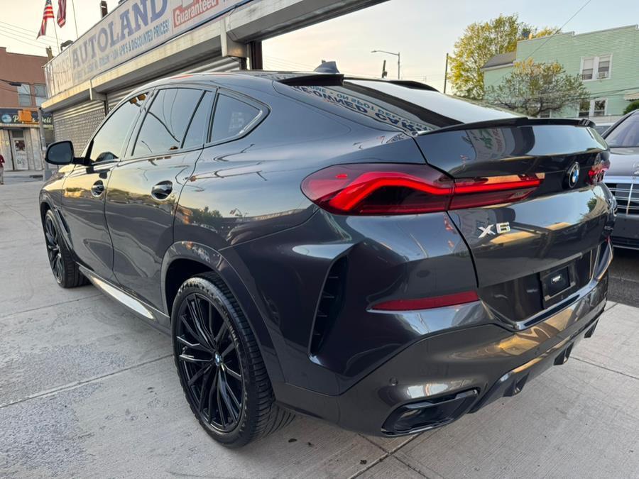 used 2022 BMW X6 car, priced at $51,999