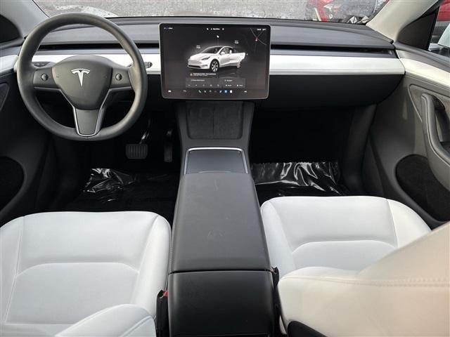 used 2024 Tesla Model Y car, priced at $38,895