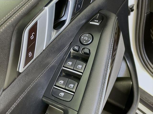 used 2024 BMW X5 car, priced at $58,911