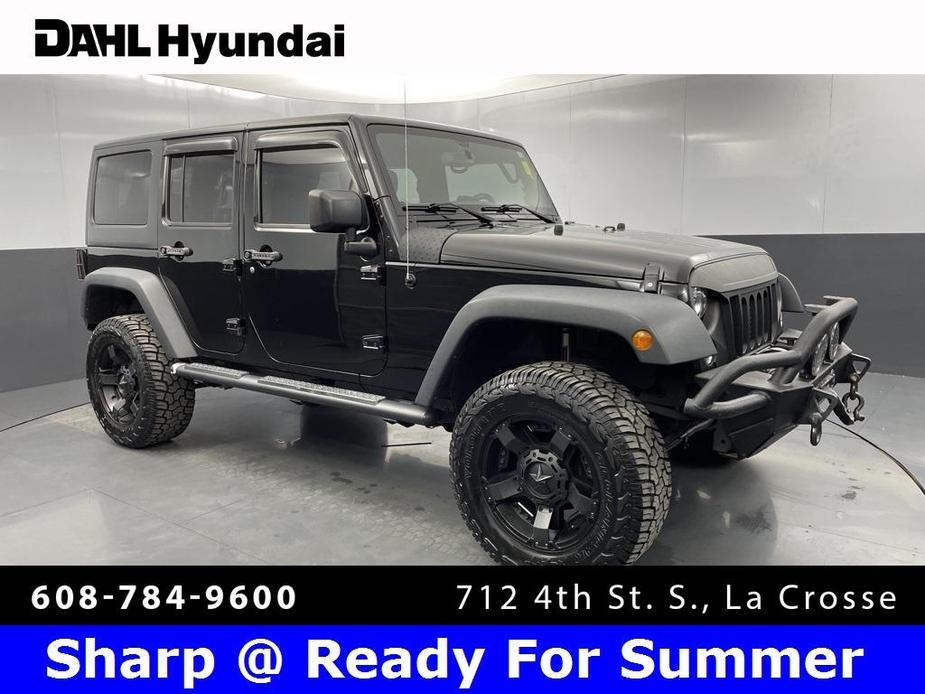 used 2015 Jeep Wrangler Unlimited car, priced at $17,992